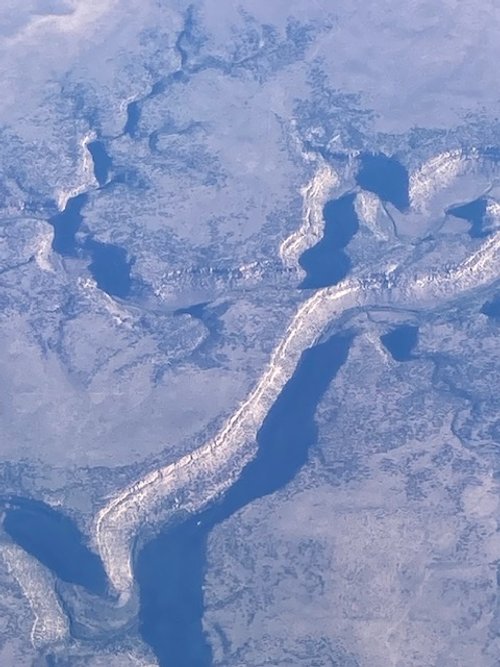 A valley below