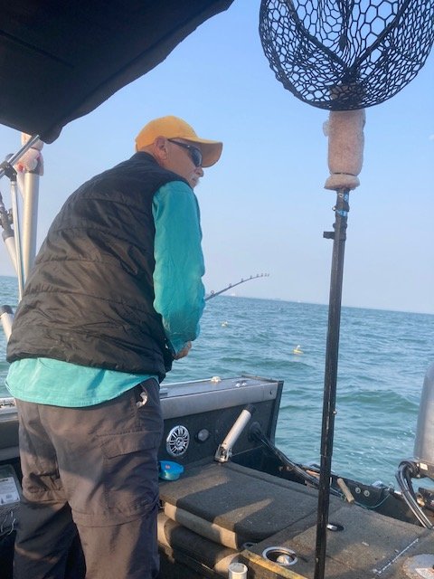 Dad had to reel in his as I was reeling in my own