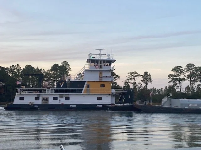 tugs on the river