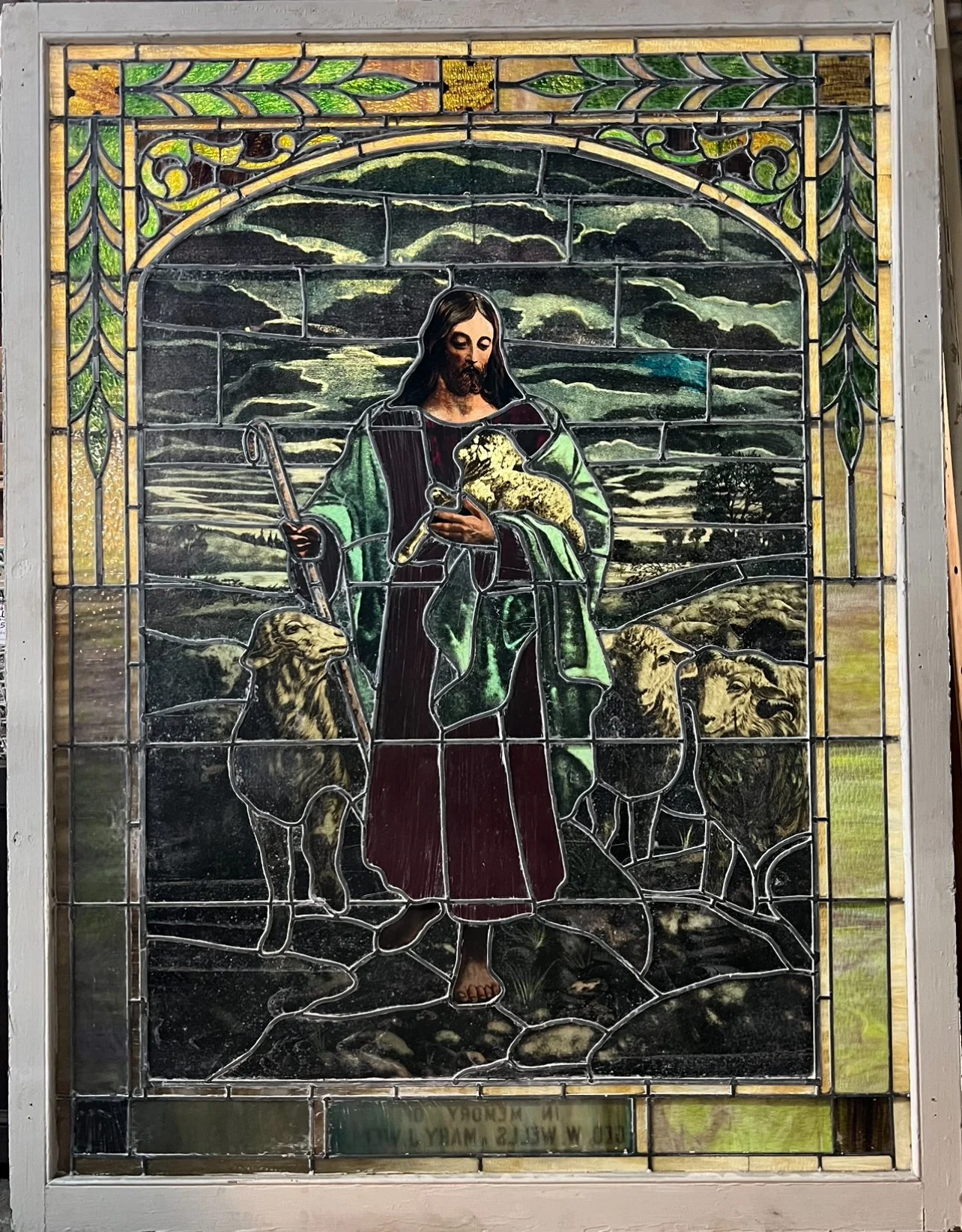 Huge stained glass windows w/ religious figure