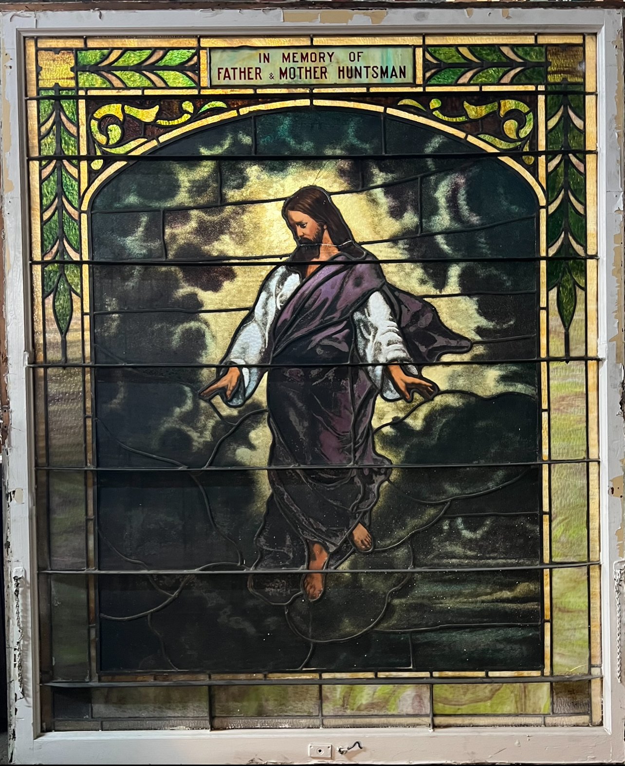 Huge stained glass window w/religious figure