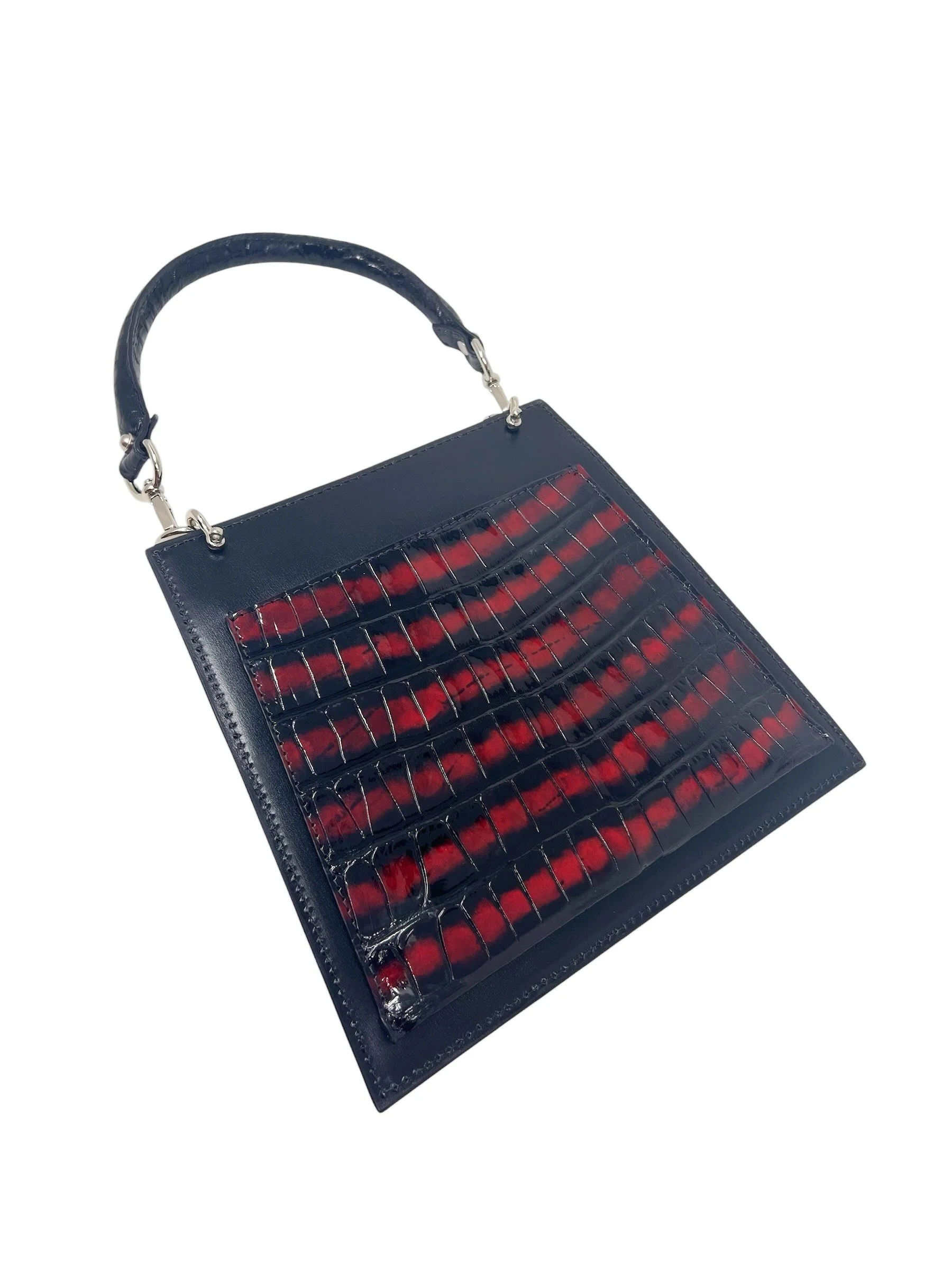 Back of the Betty Sanguine showing the banded red and black alligator and back slip pocket