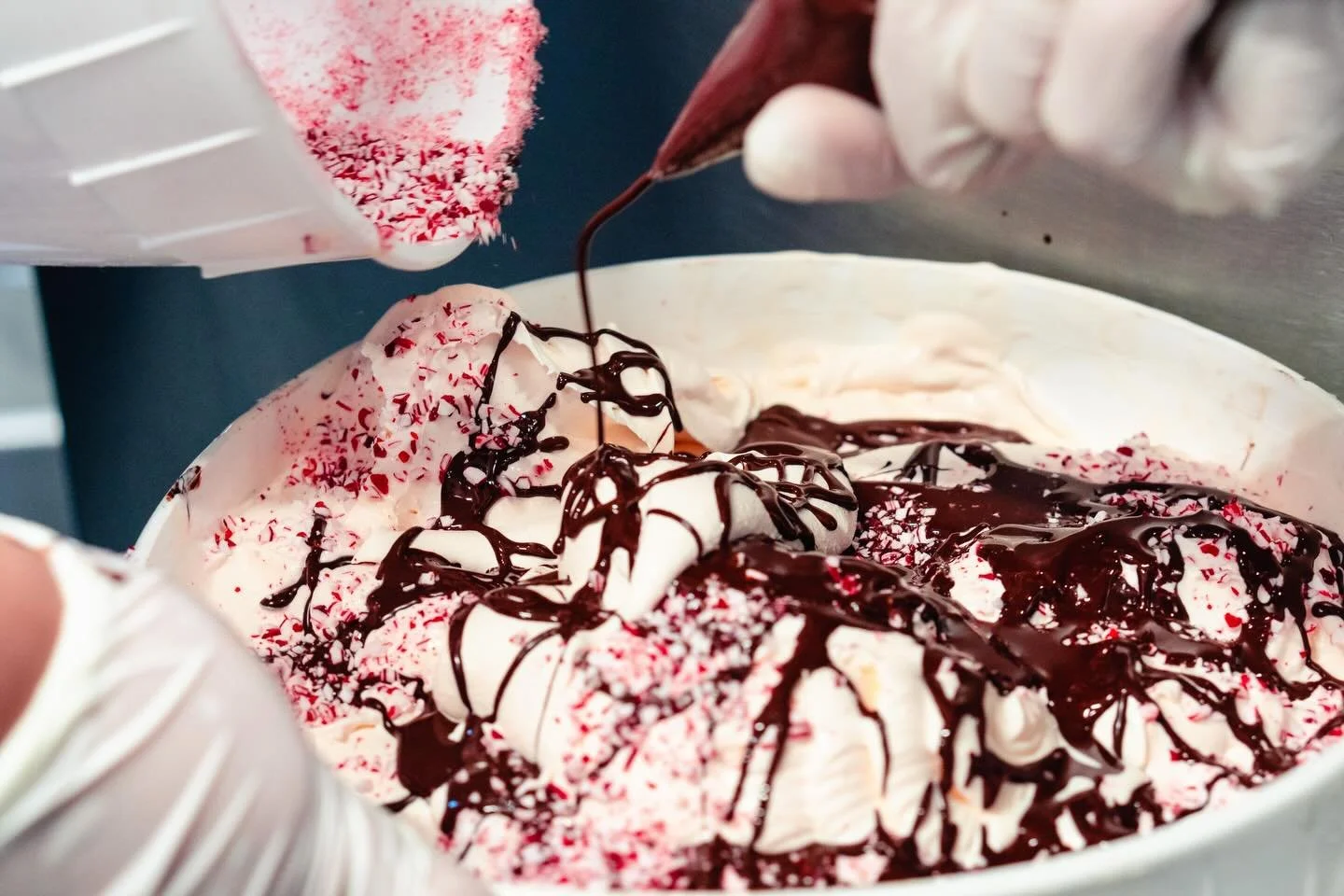 Peppermint ice cream sprinkled with naturally-colored, crushed candy cane pieces and drizzled with crunchy ribbons of Belgian dark chocolate stracciatella!