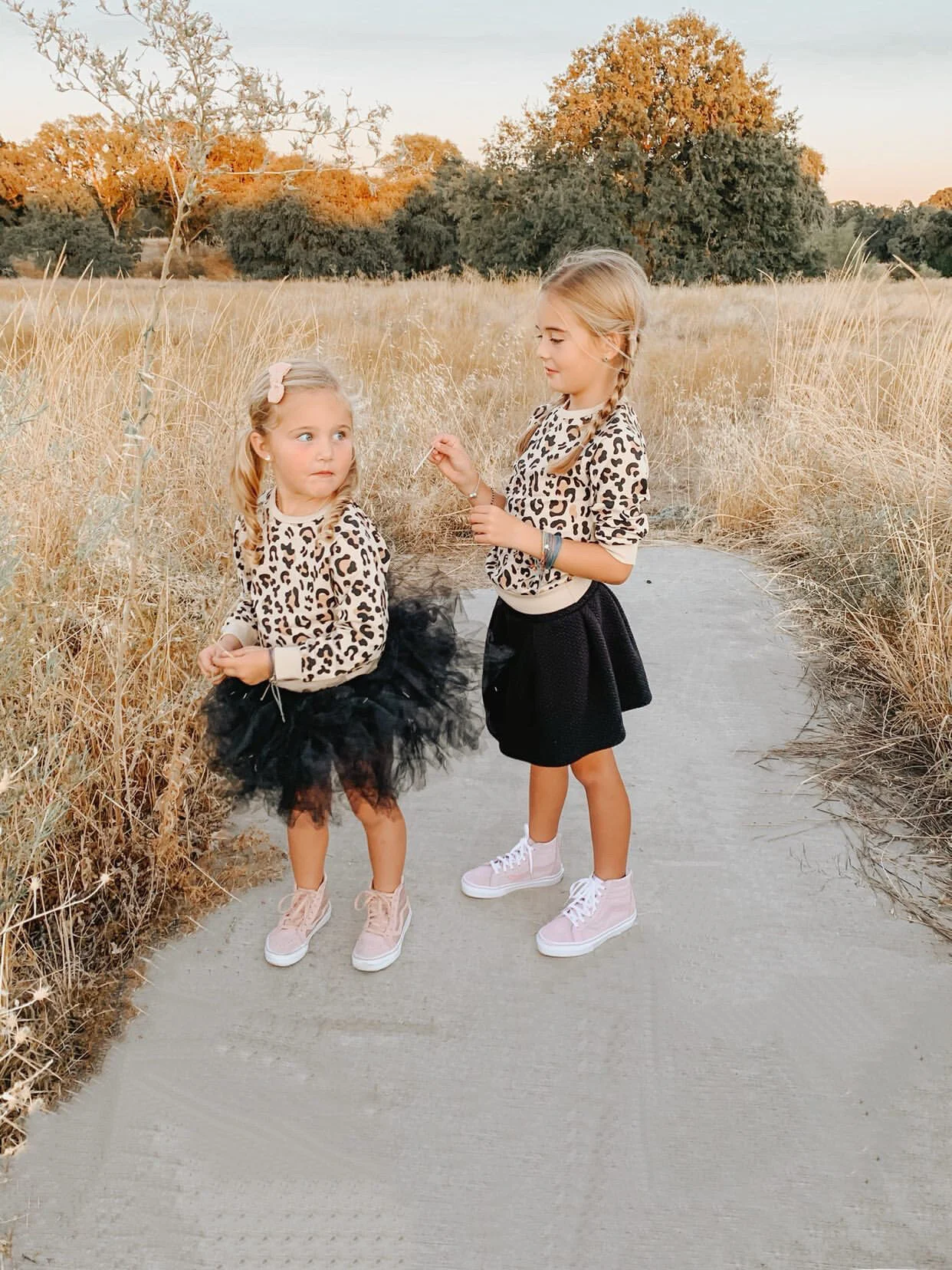 Sisters in our Halsey leopard sweaters!