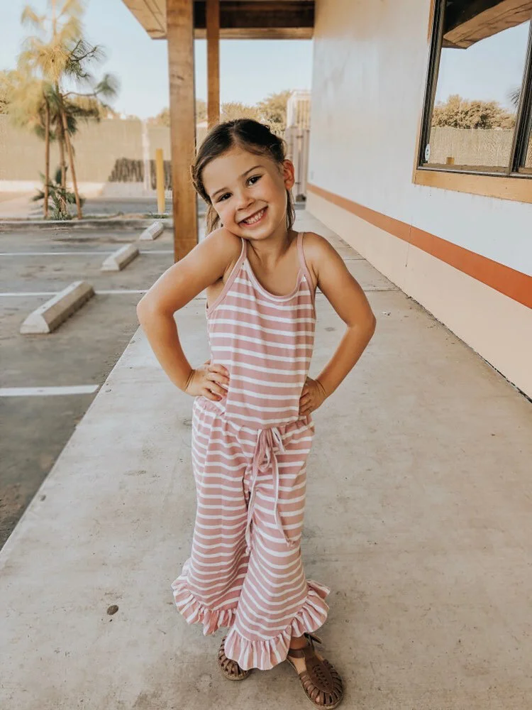 Charlie looks so cute in our Lila Romper!!