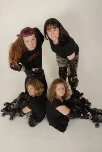 DeeAnn Apgar (Curly Shrew), Polly Carr (Carr Wreck), Lori Gage (Twelve Gage), and Heather McGee (Bad-Weather Heather)