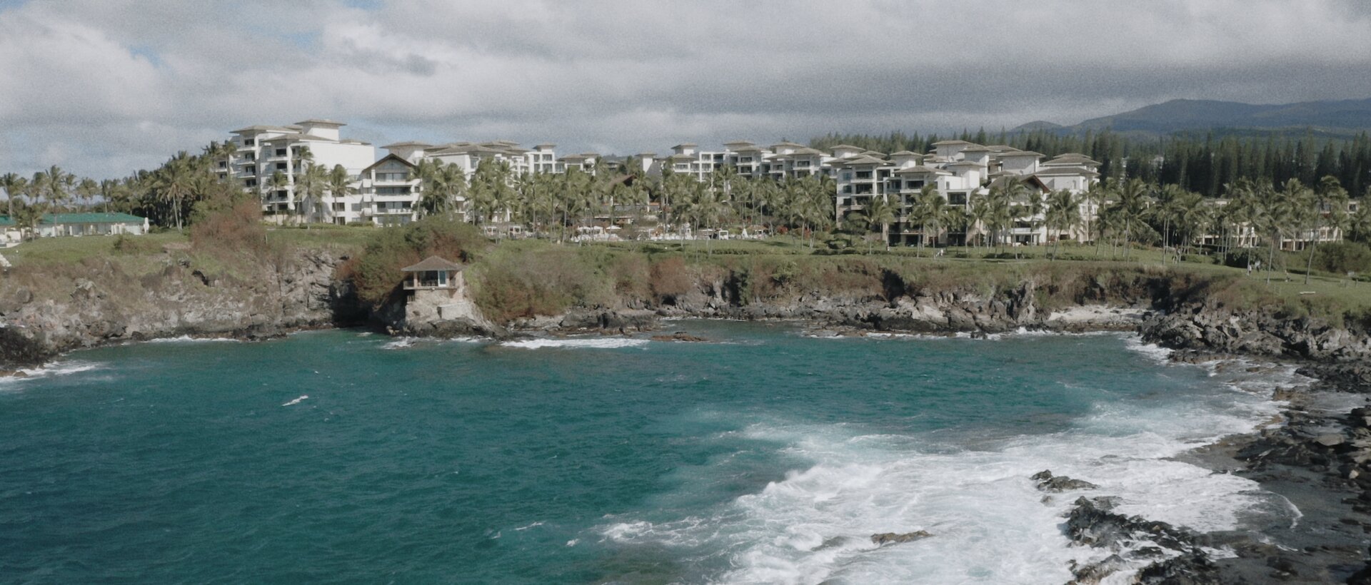 Montage Kapalua aerial drone shot cliff house