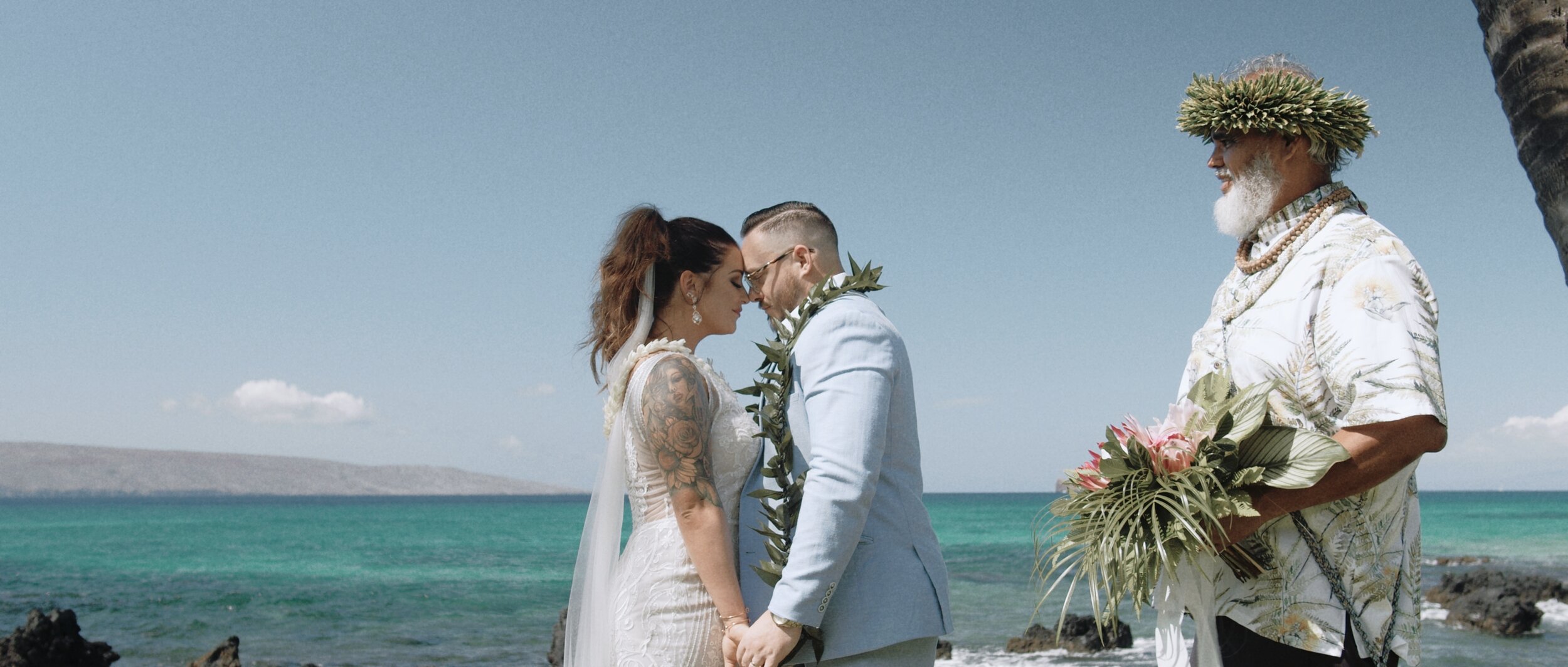 Bride and groom sharing the aloha