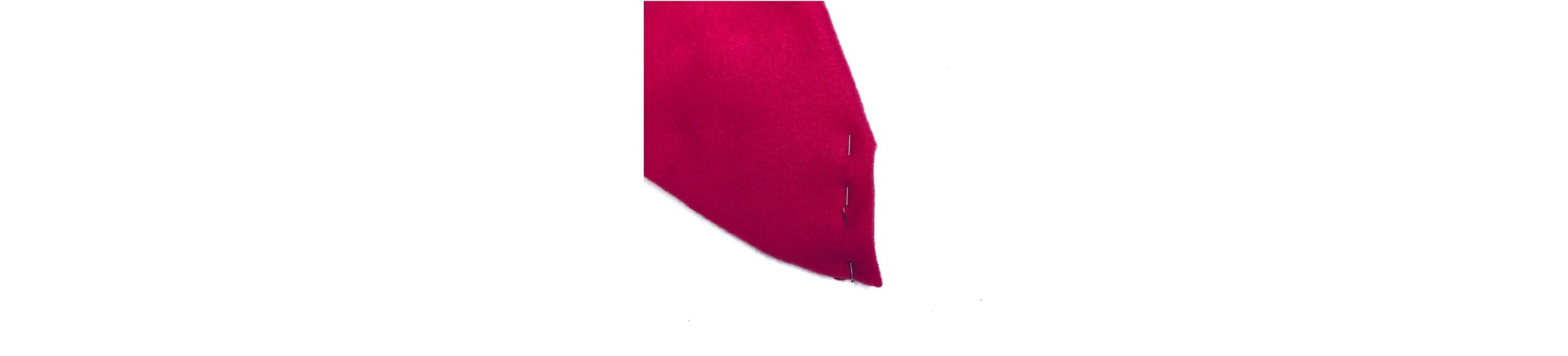 Fold over with fabric right sides together and pin along the legs of the dart