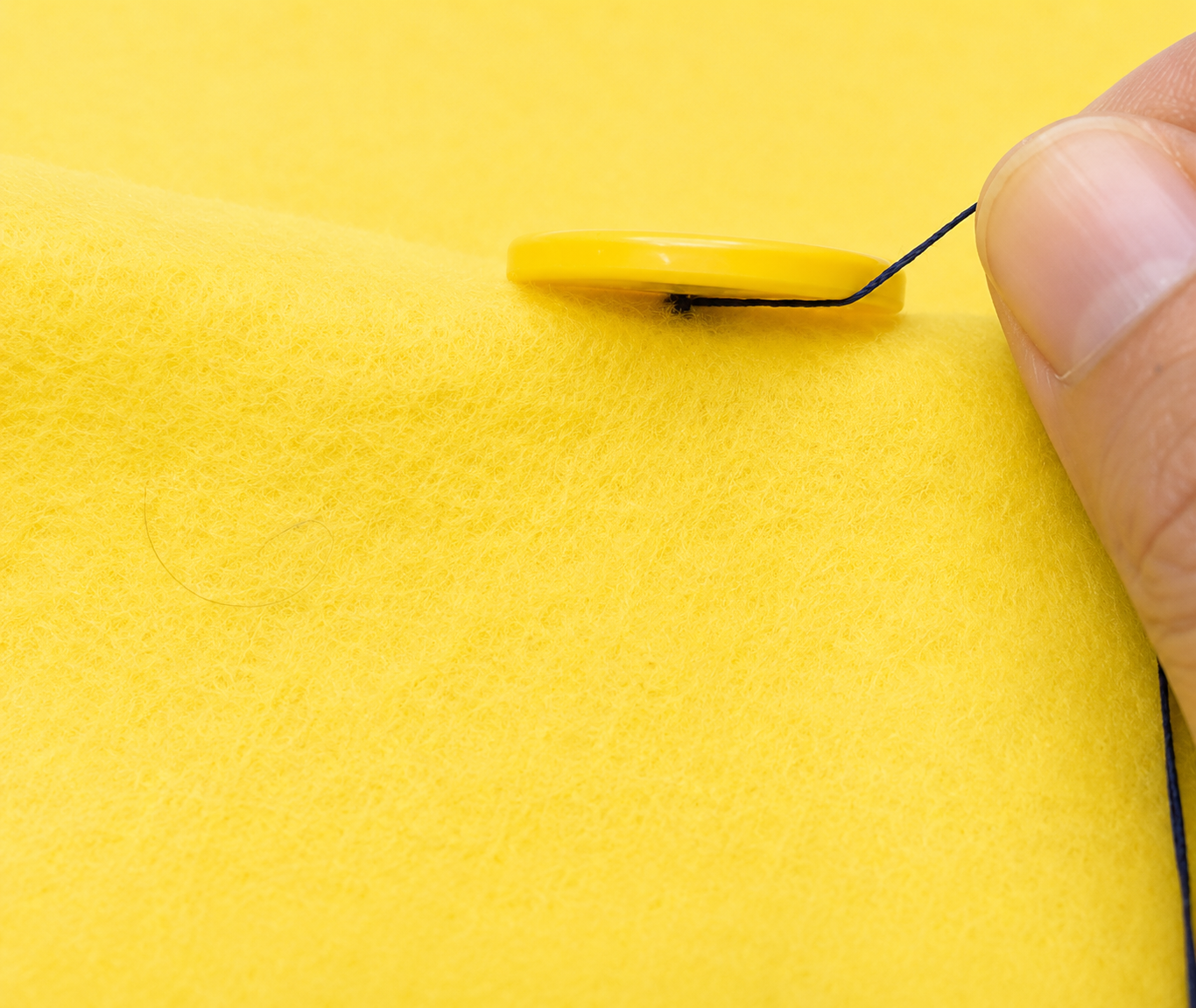 step 8 how to sew a button.png