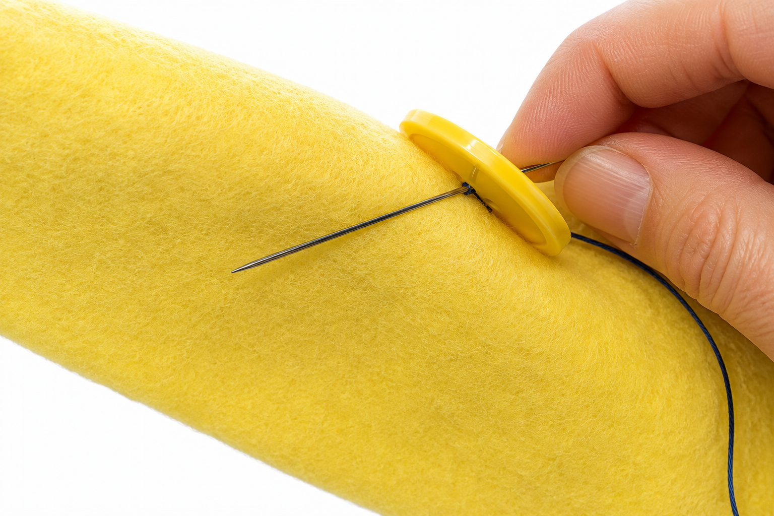 step 7 how to sew a button.png