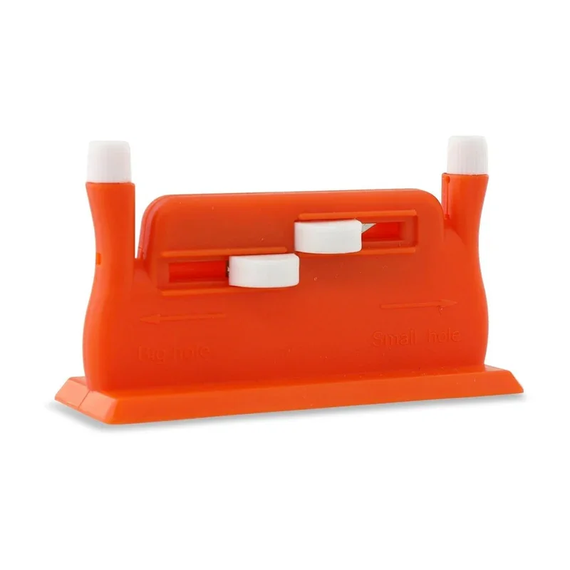 Orange and white plastic knife sharpener with two sharpening slots.