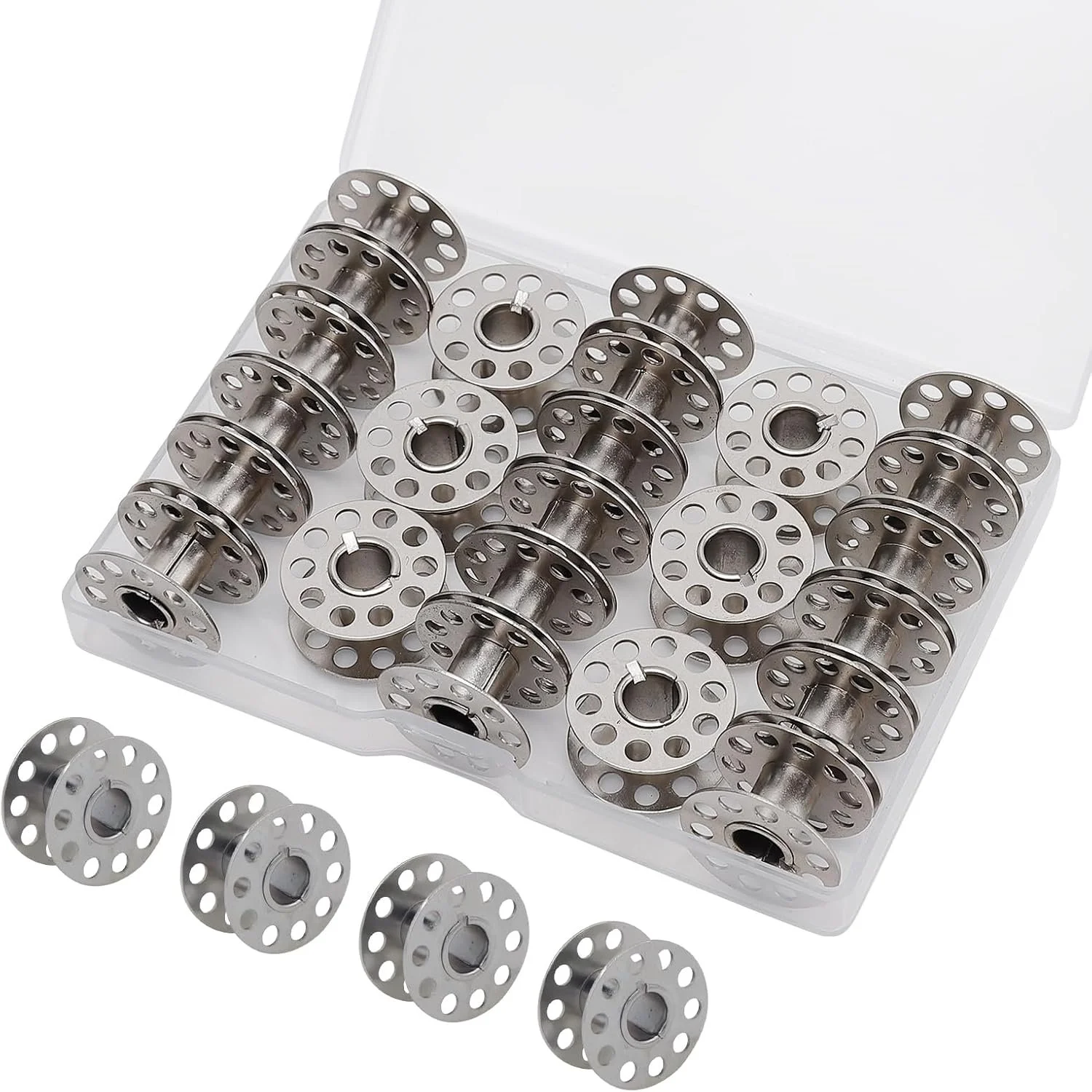 Set of metal bobbins in a clear plastic storage case, with several bobbins scattered outside the case.