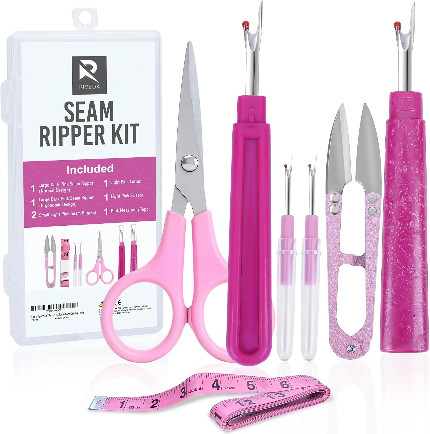 A pink and silver sewing seam ripper kit with scissors, seam rippers, a measuring tape, and other sewing tools arranged in front of the packaging.