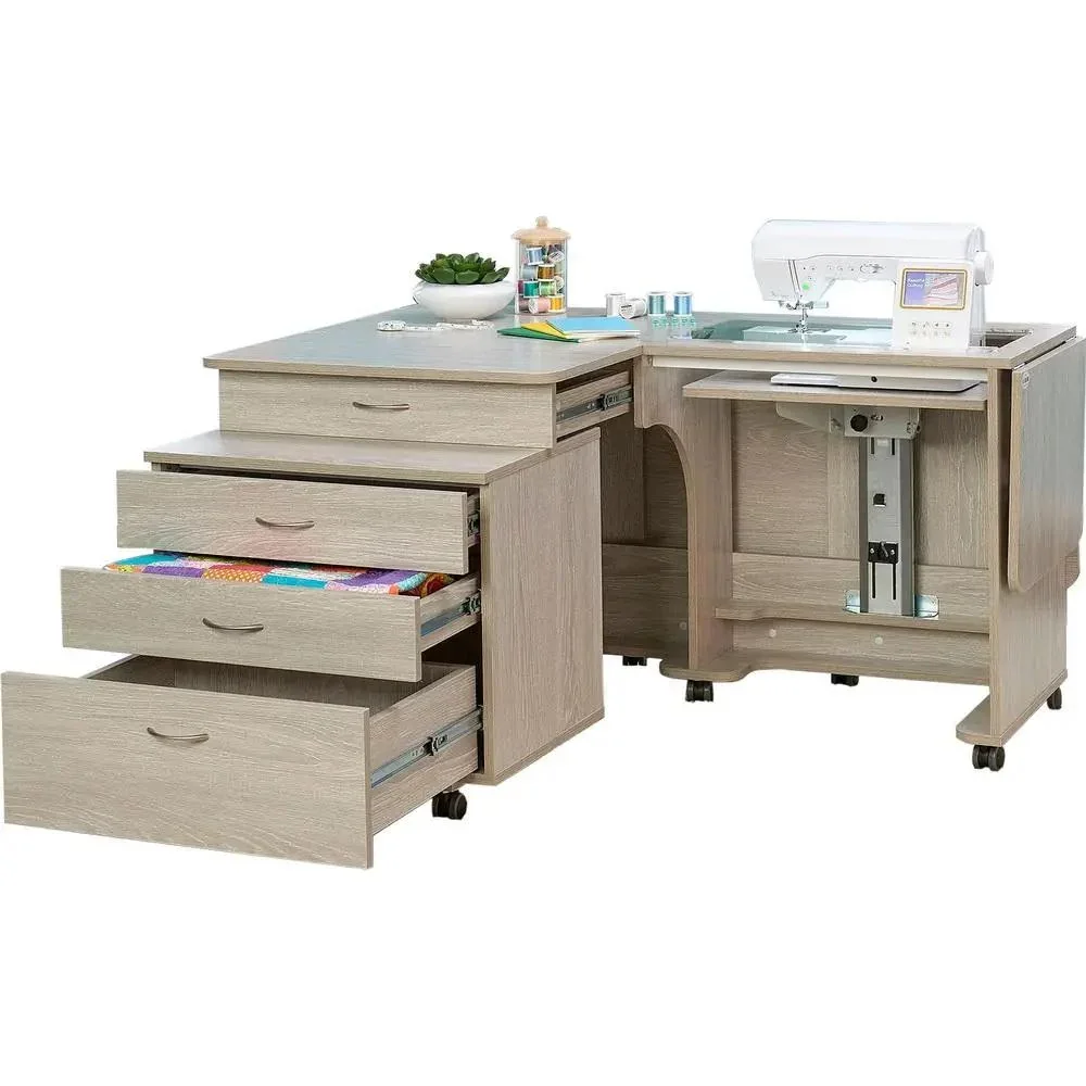 A light wood sewing desk equipped with fabric drawers, a sewing machine, and sewing supplies.