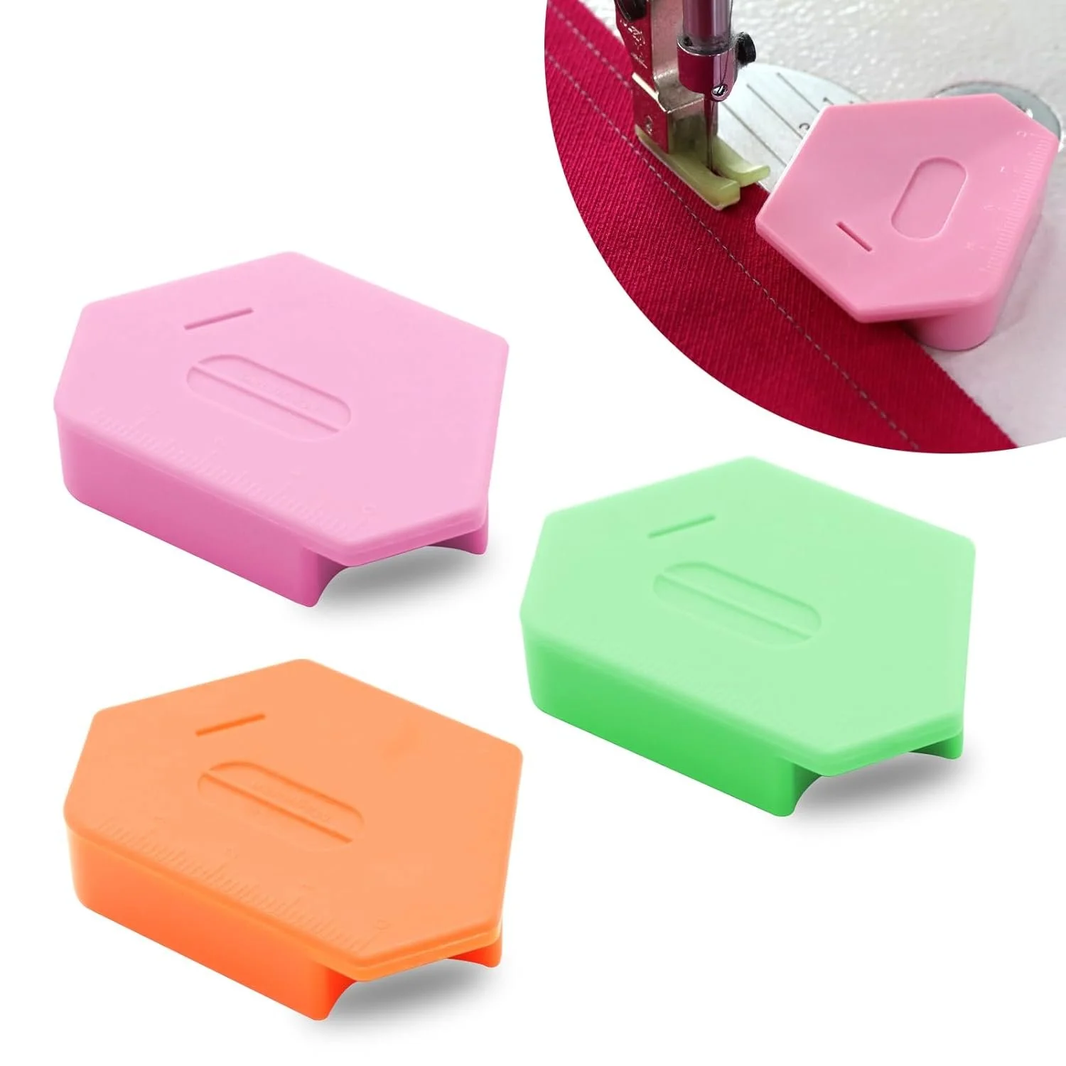 Colorful sewing clips in pink, green, orange, and purple on a white background, with one clip attached to a sewing machine fabric.