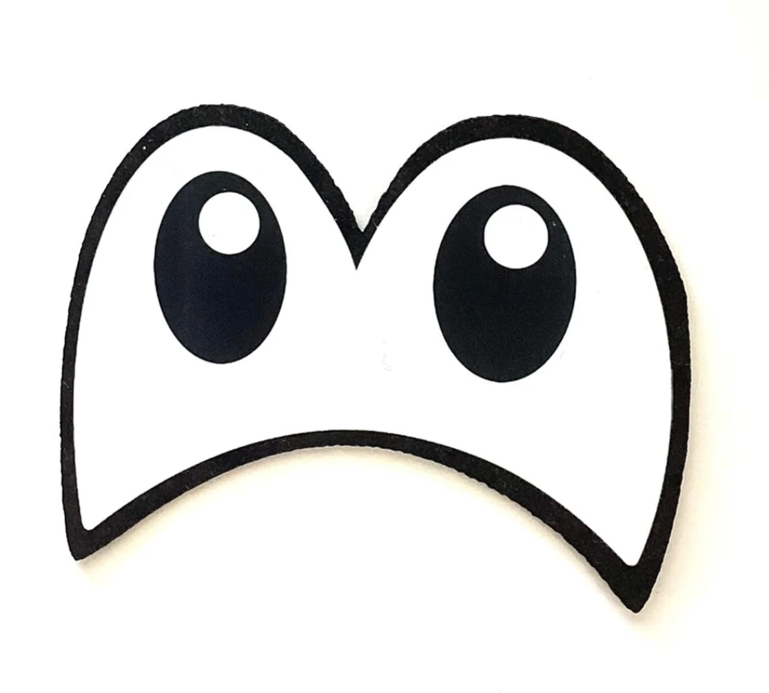 Black outline of a cartoon ghost with large black eyes and a curved mouth, on a white background.