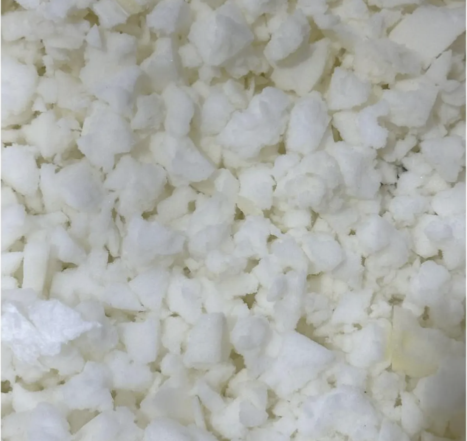 Close-up of crumbled white cheese.