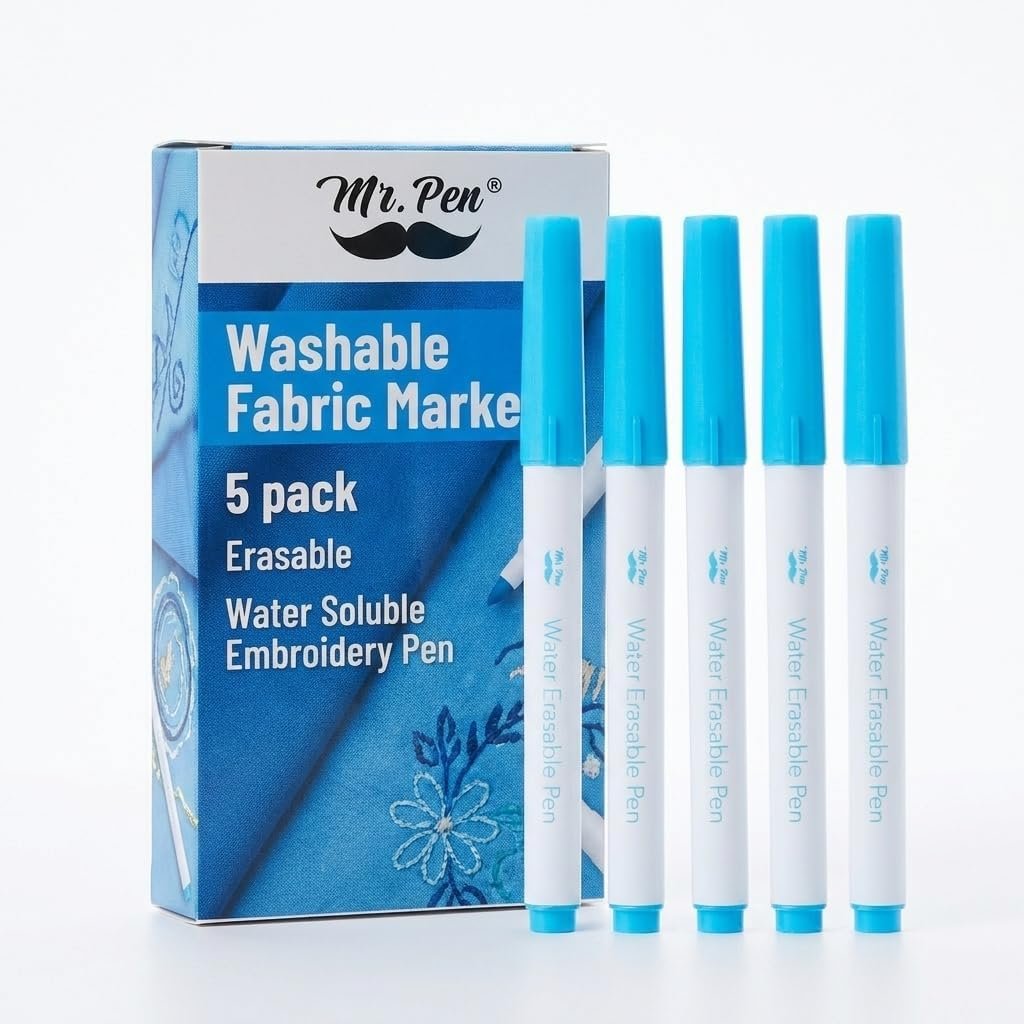 Five blue and white washable water-soluble embroidery pens standing in front of a blue box labeled "Mr. Pen Washable Fabric Marker 5 pack Erasable Water Soluble Embroidery Pen."