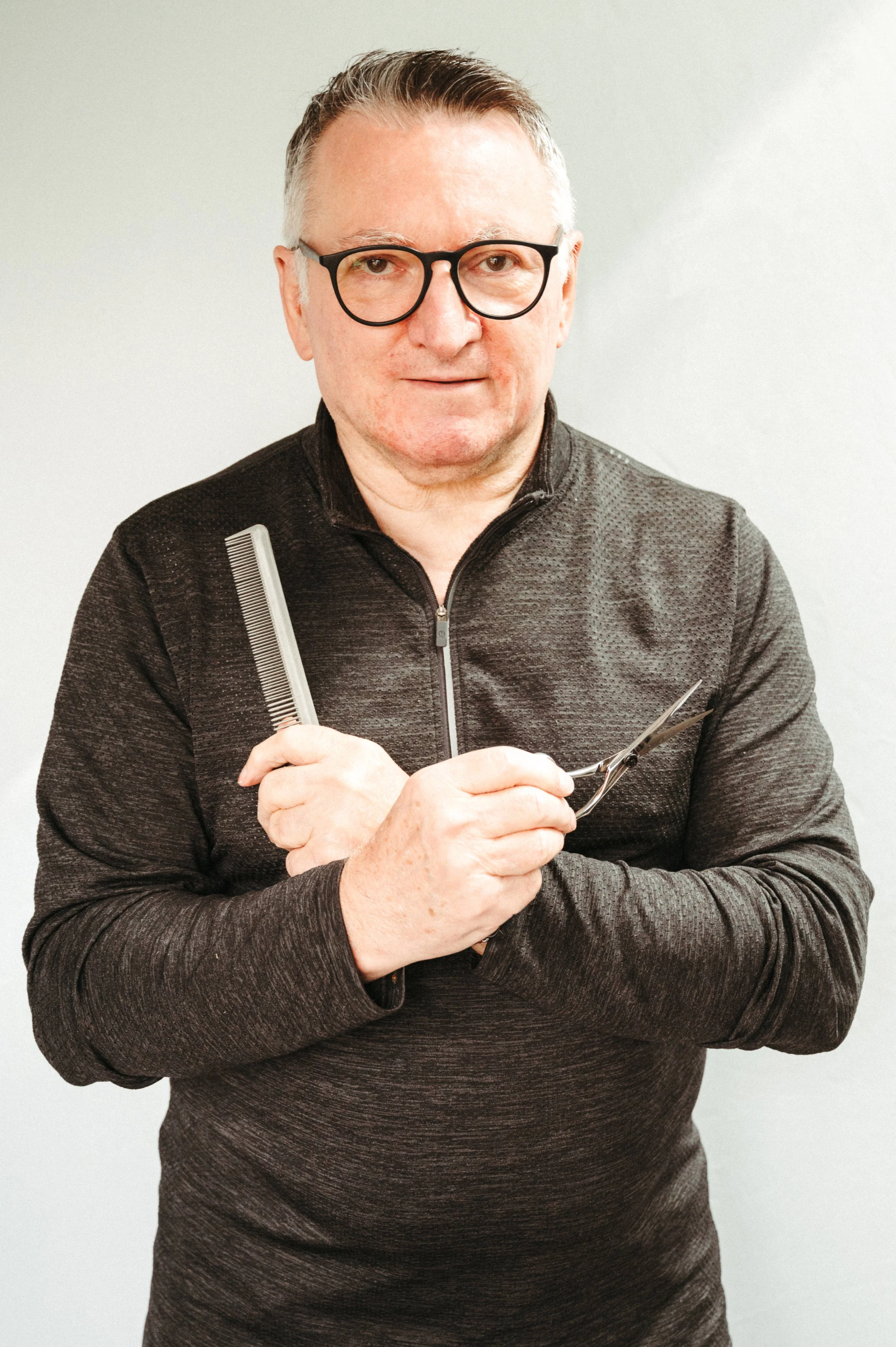 Anthony with comb and scissors.jpg