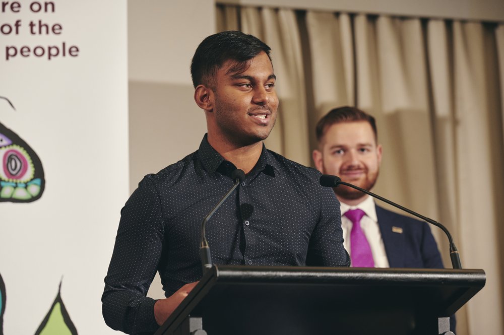  Jahin speaking at a conference 