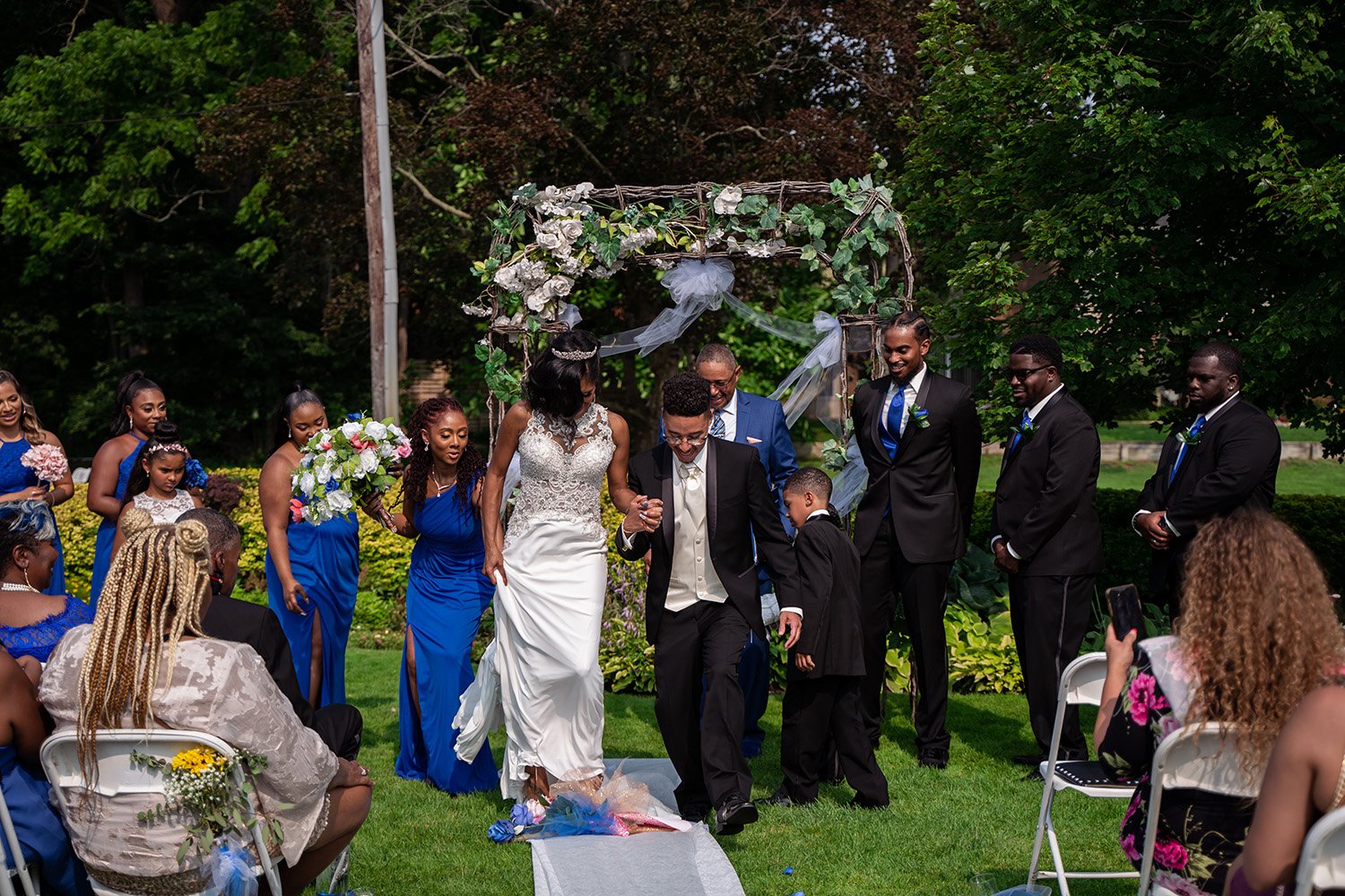jumping over the broom 