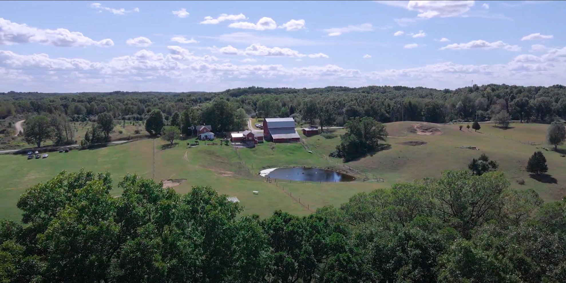 Main house on family farm in Delton MI, drone photo by wedding videographer at AA studios LLC