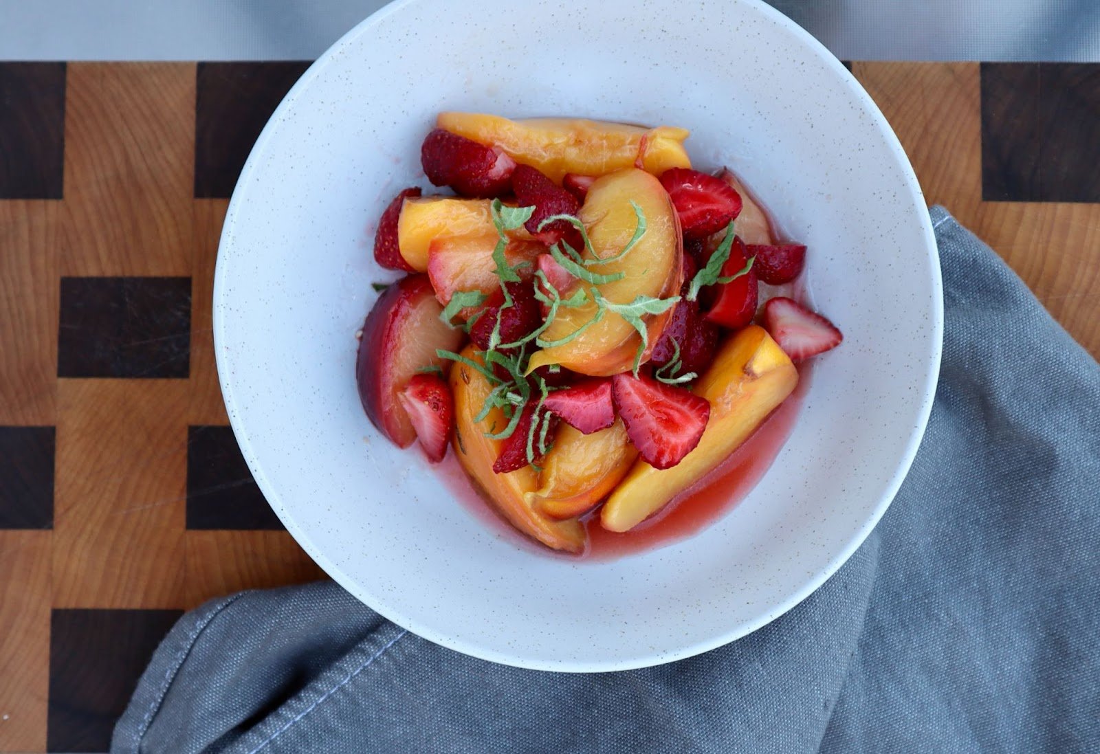 Warm Fruit Breakfast Bowl with Apricots and Strawberries — Hale Pule
