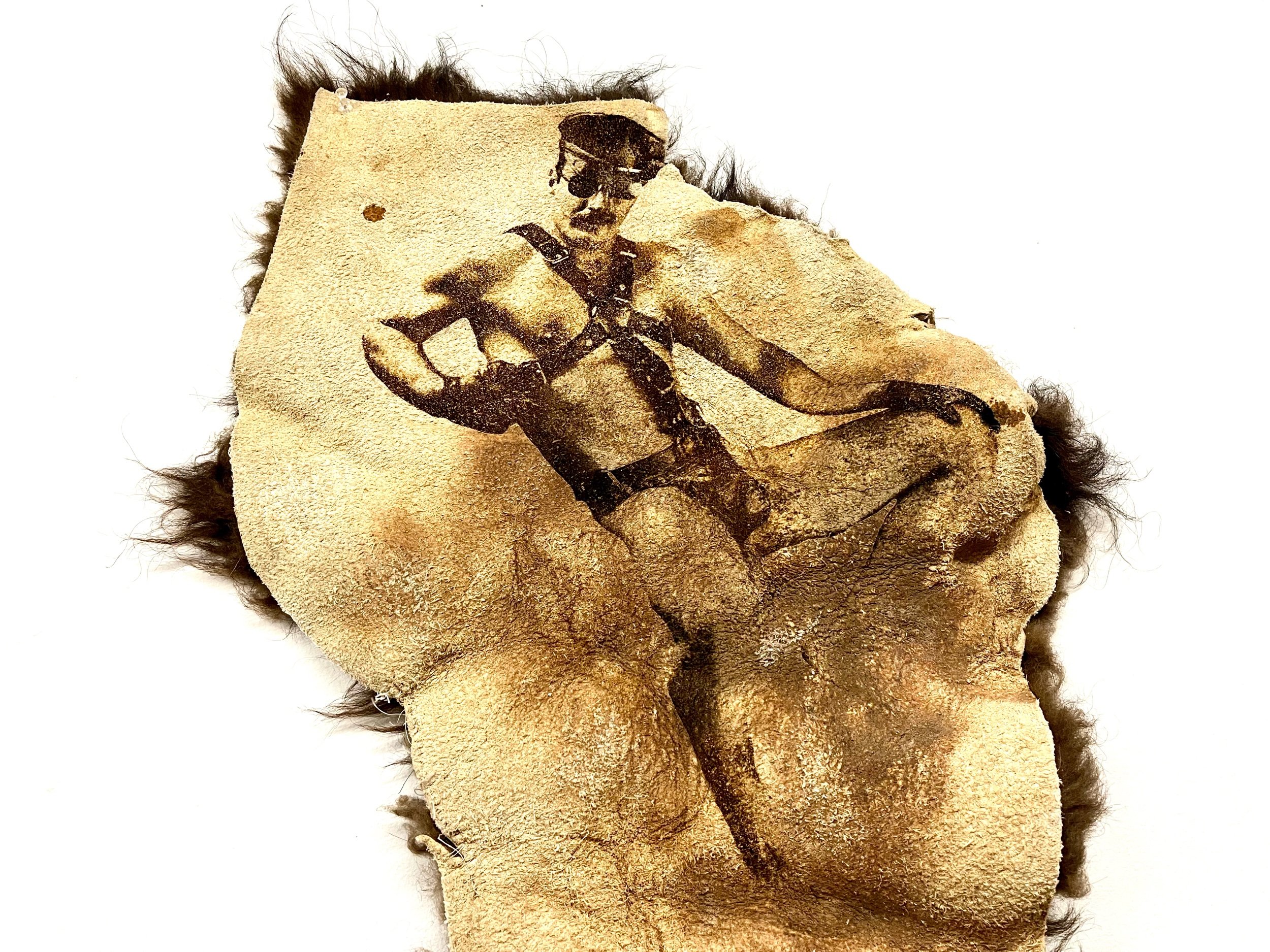  In my exploration of the intersection between Queerness, leather culture, and the hunt, I am delving into the realm of bison hides and using a laser-etched image-making process. This artistic endeavor aims to dive into the nuanced layers associated 