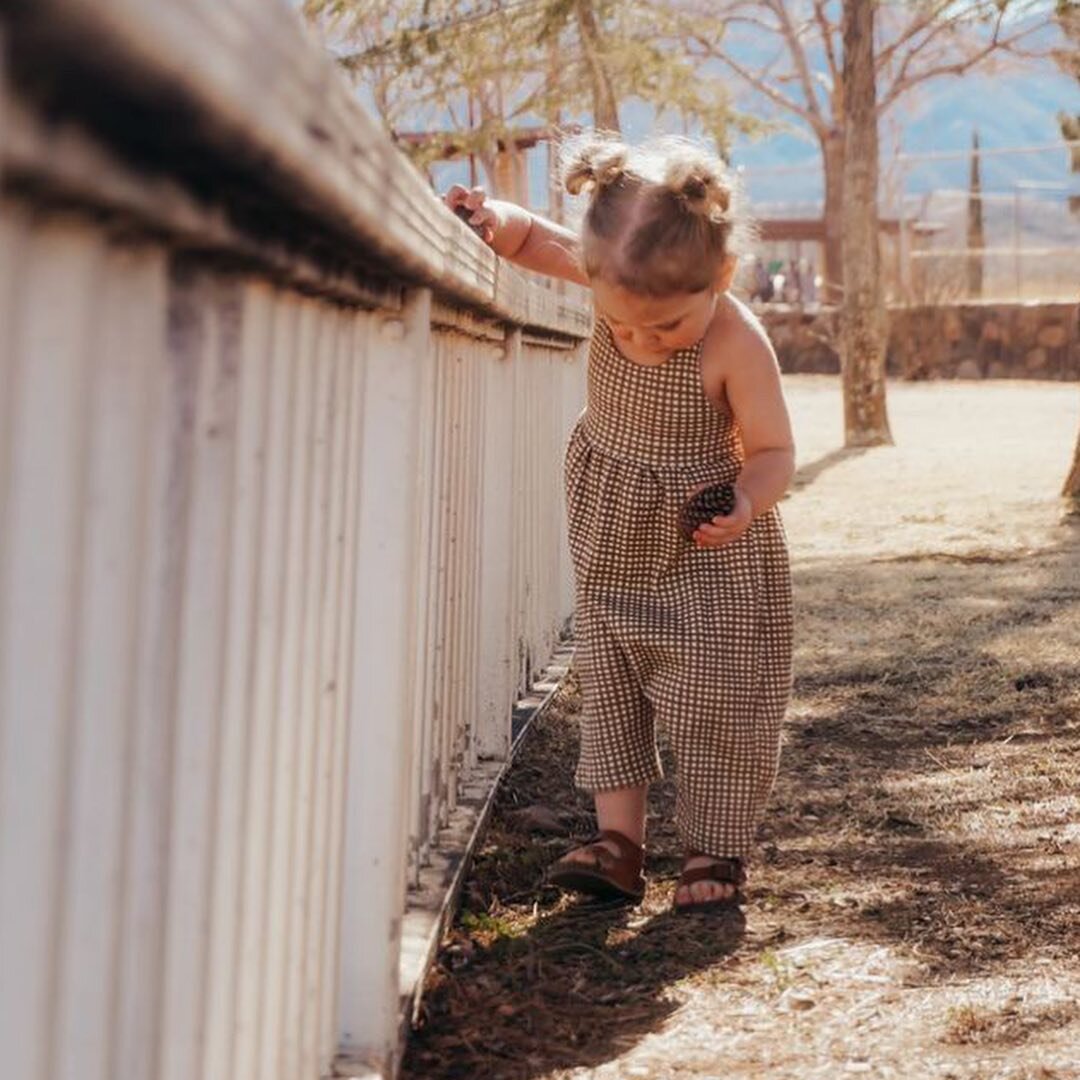 Love these photos from @lornafranco_ so so beautiful, don&rsquo;t you just love this little play suit she&rsquo;s wearing!! Made up in my cute Picnic Gingham pattern (fabric from @littlecocalico )
Direct link in my bio @h_u_f_t_o_n 
How lovely is it 