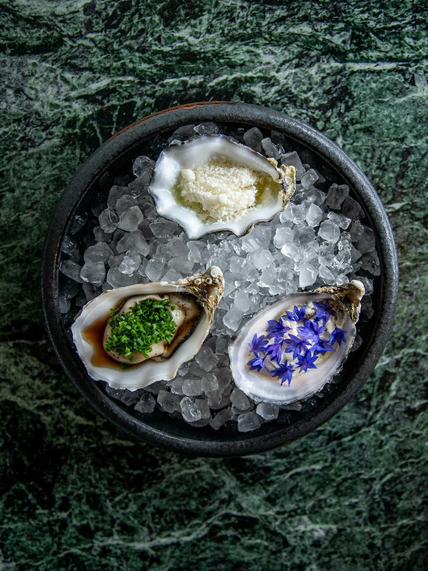 A signature welcome at Krogs 🦪 
Gillardeau Oysters:
 Truffle ponzu and chives
 Yuzu cream and hazelnut oil
 Horseradish snow and citrus