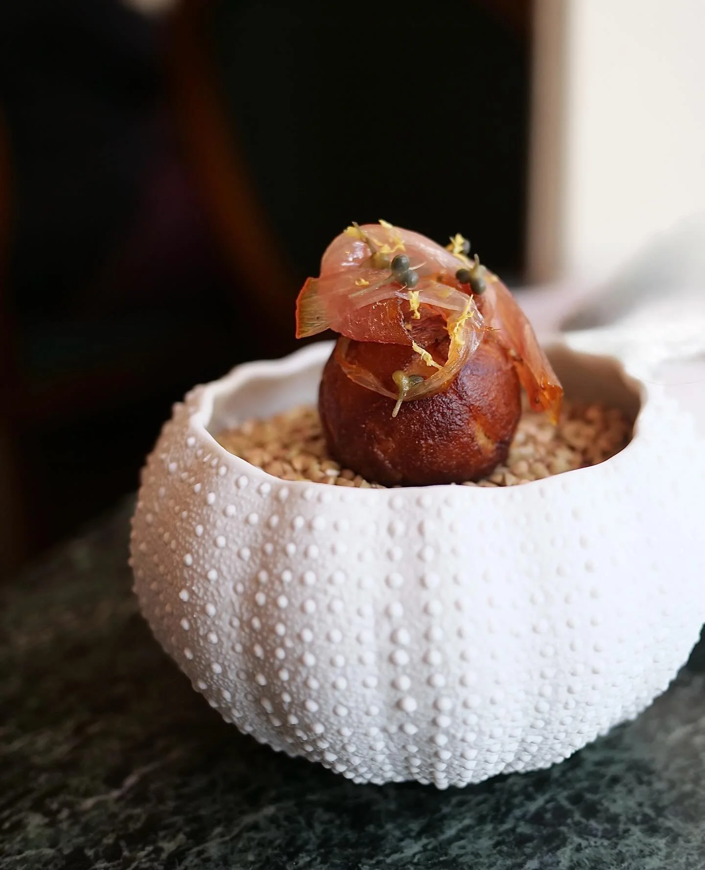 Our &ldquo;&aelig;bleskive&rdquo; donut with dry-aged tuna &ndash; an umami-packed start to the meal here at Krogs. We&rsquo;re back in the kitchen tonight. See you around!
.
.
.
#krogsfiskerestaurant #tuna