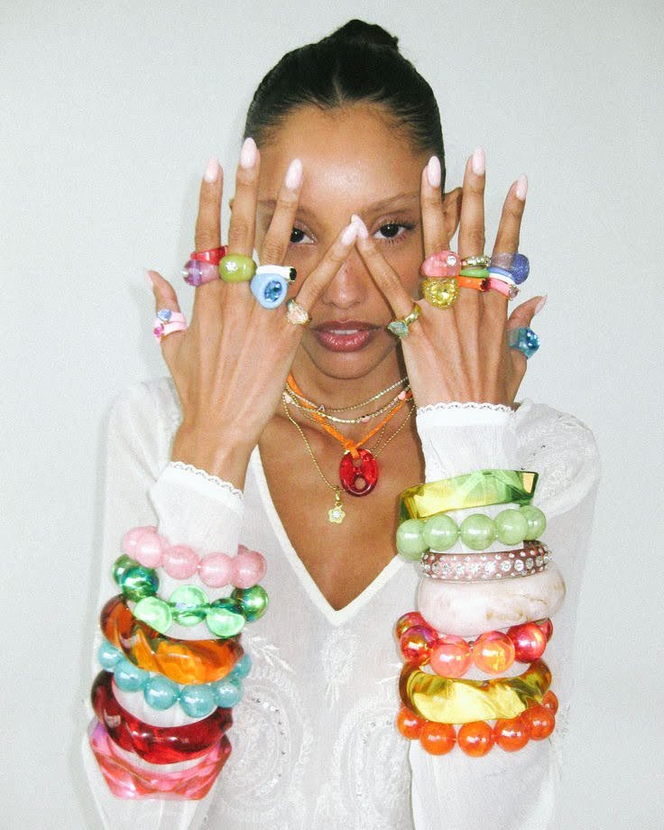 Playful jelly-inspired bracelets and 3D jewelry in bright colors, reflecting a nostalgic kidult aesthetic