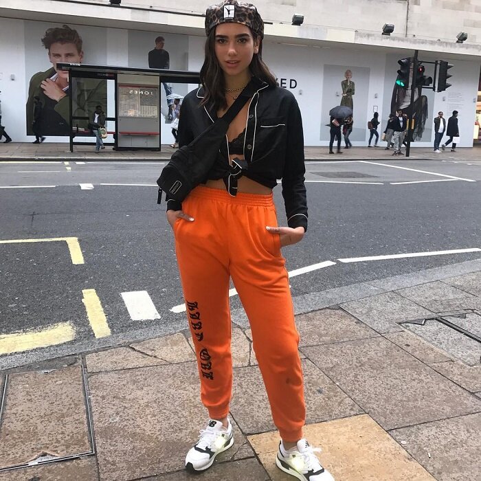 Dua Lipa's 'Matrix'-Inspired Outfit Included a Hood and Glamorous