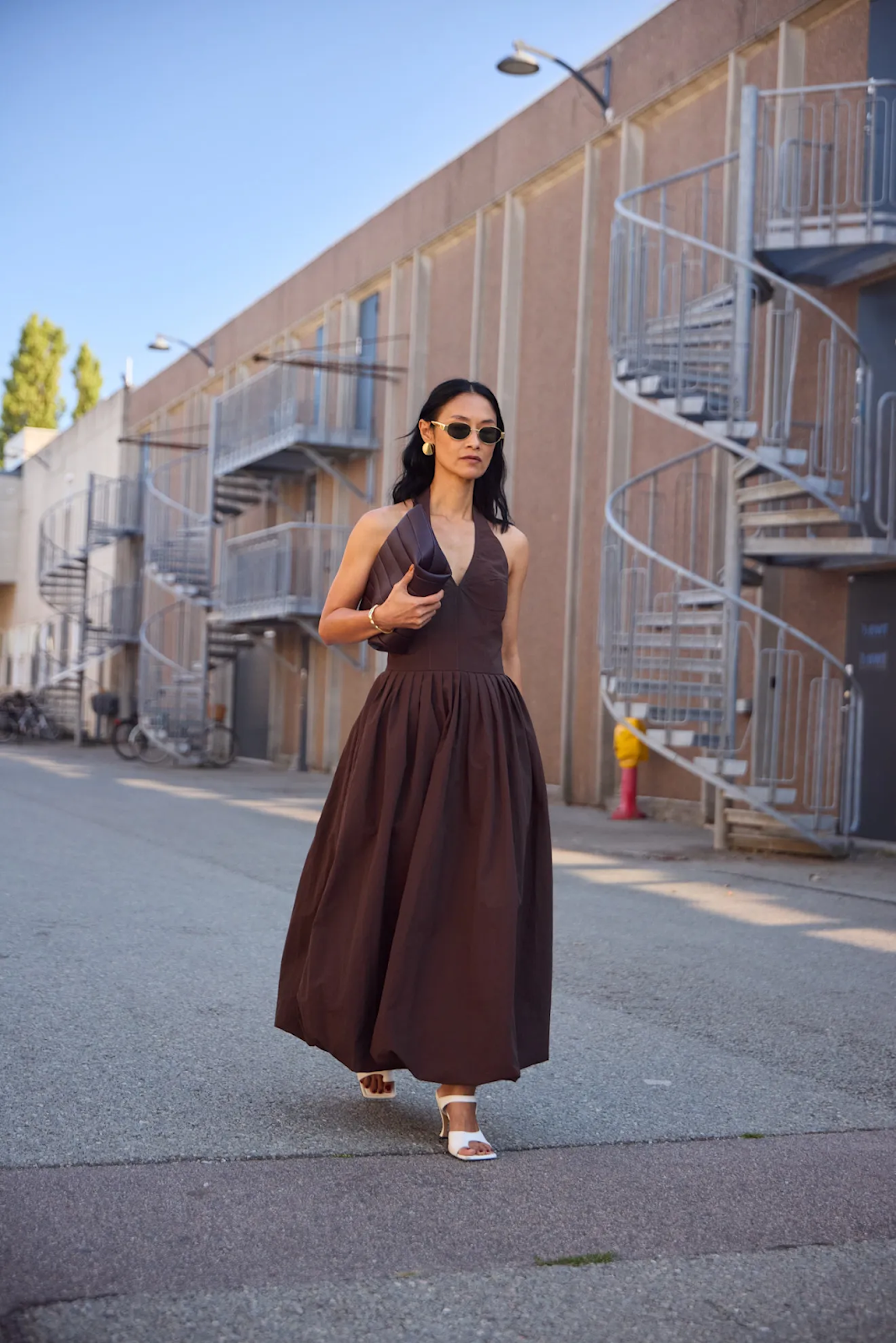 woman wearing brown midi dress