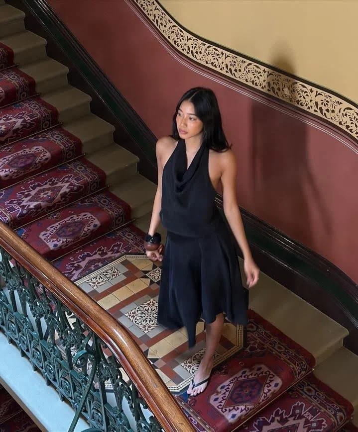 girl wearing black matching skirt set flowy