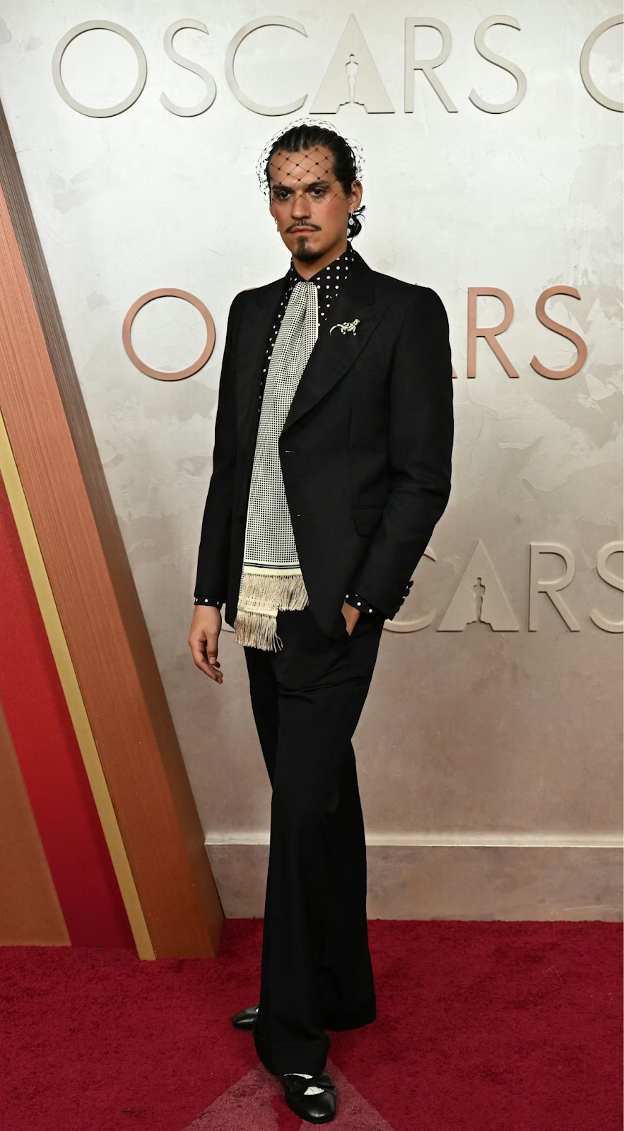The Academy Awards: Omar Apollo on the red carpet in a suit