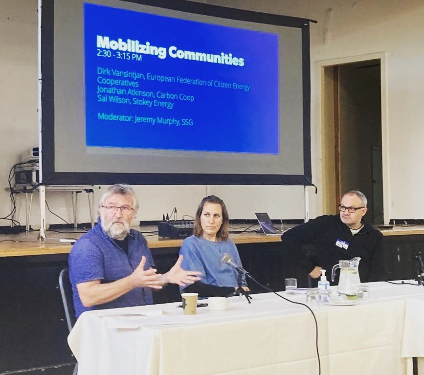 Stokey Energy taking a place at the table next to our heroes, Dirk Vansintjan the founder of @rescoop.eu and Jonathan Atkinson of @carbon_coop_mcr and @peopleretrofit. Great to talk about the importance of community energy and learn from their truly 