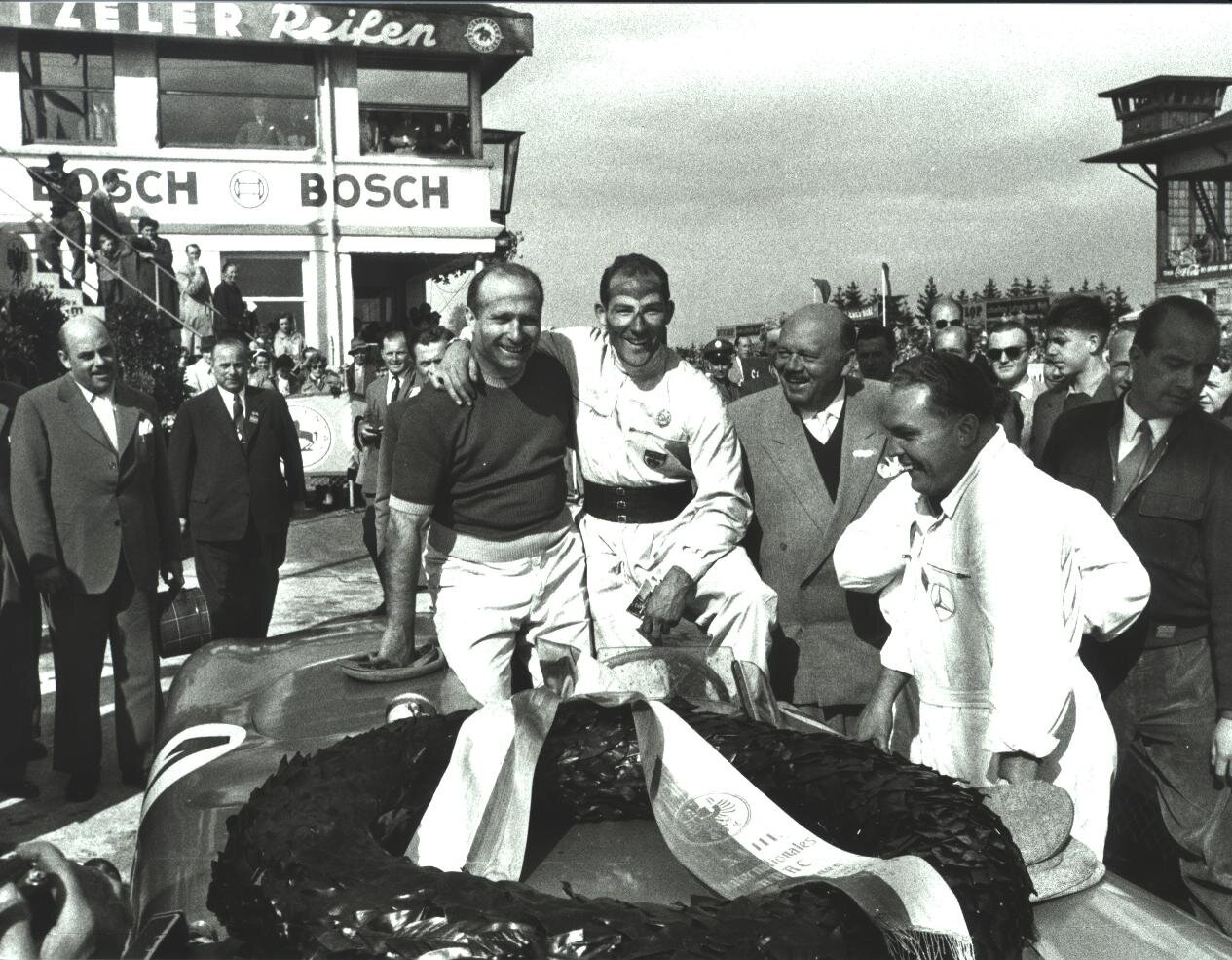 Detour roadtrips_memories of Stirling Moss_with Fangio.jpg
