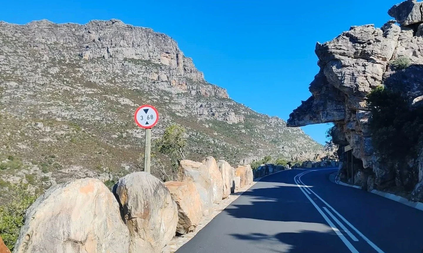 South Africa;s Bainskloof Pass is narrow and has a strict height limit as overhanging rock formations such as Dacre's Pulpit have remained in place since the very early days of construction. ⁠
⁠
The initial stretch is characteristed by many hairpins 