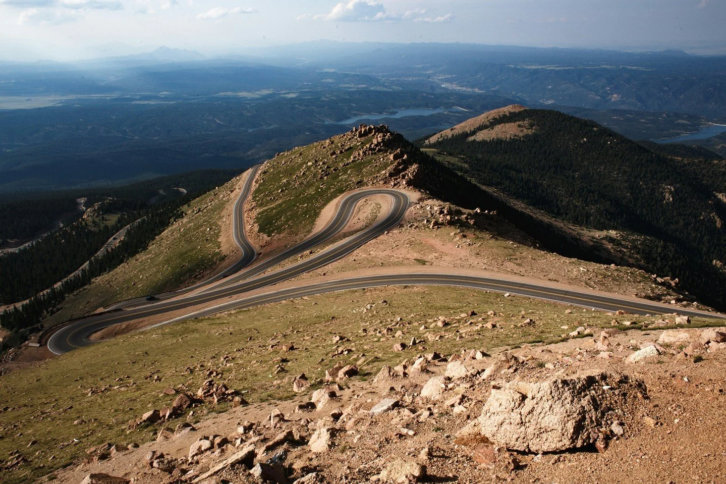 Driving the road for the famous Pikes Peak International Hillclimb is definitely a bucket list item. It&rsquo;s conscripted from the public for the race one week each year for the course that runs 12 miles up into the clouds at the top of Pikes Peak,