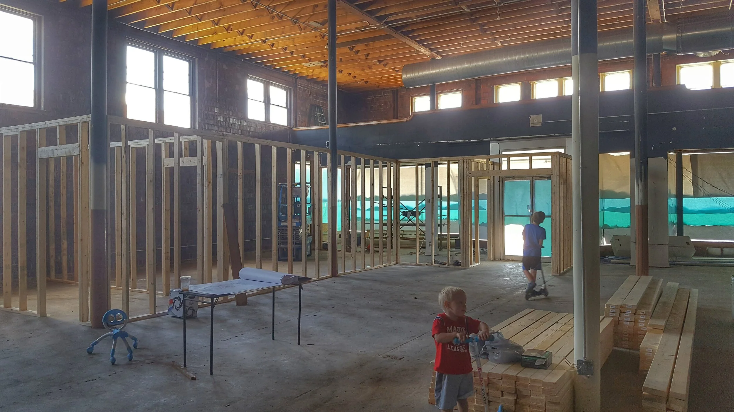 Harlan and Perry were often scootering around the construction site