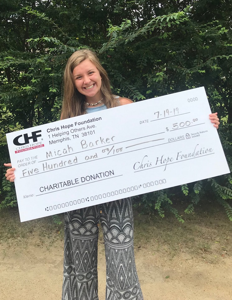 Micah Barker-CHF check presentation.jpg