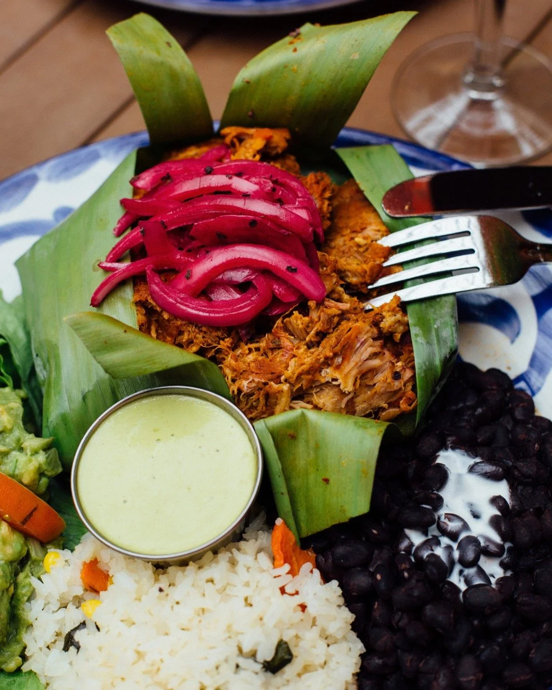 Our Cochinita Pibil is a recipe passed down with love. &hearts;️ Slow-cooked pork shoulder, marinated in achiote, and wrapped in banana leaf &mdash; a true Yucat&aacute;n treasure made with family tradition and served right here in Central Texas.

#s