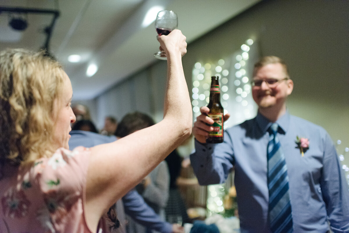 Groom toasting a guest at Kingston, Ontario wedding