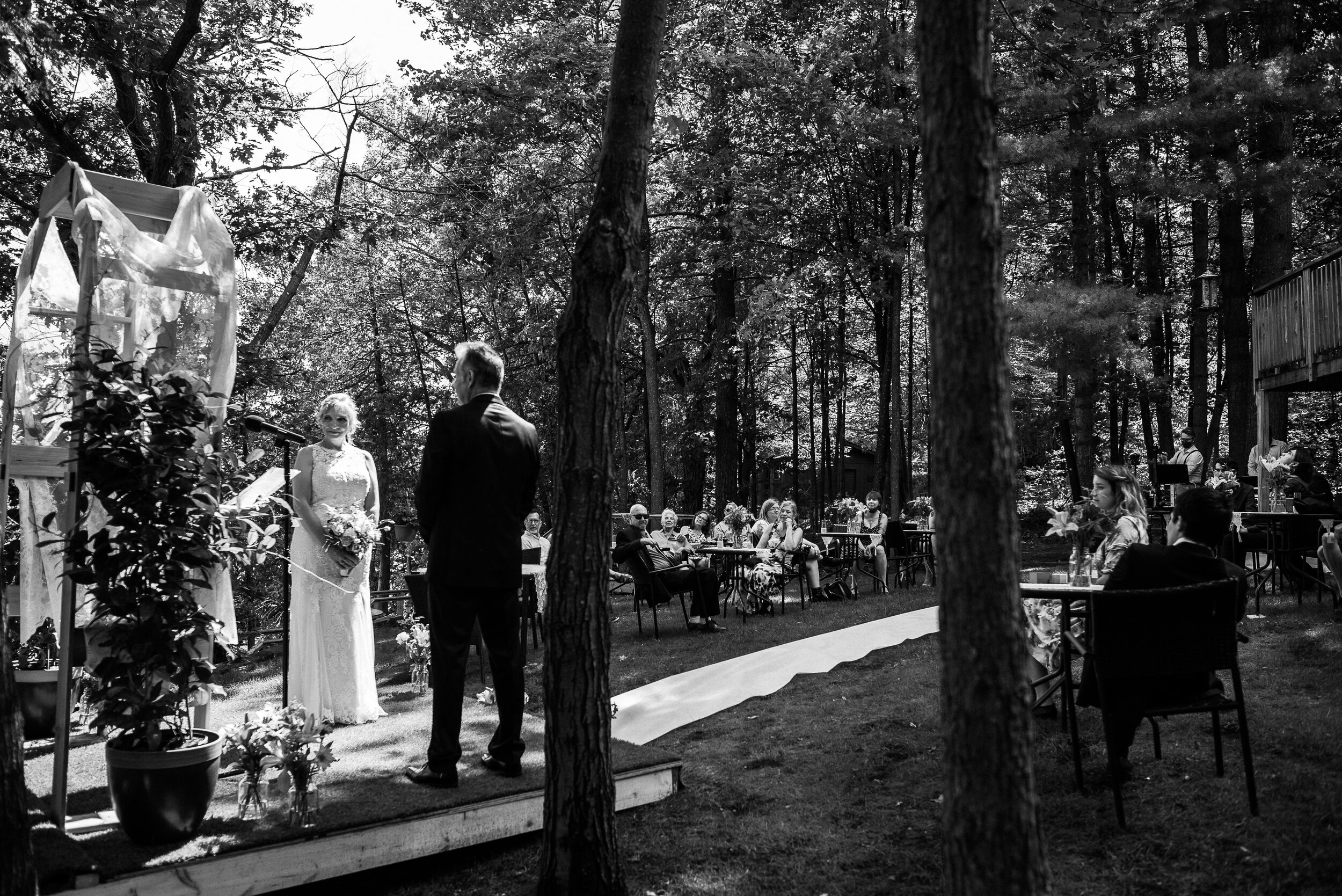 Bride and groom during their ceremony in Verona, Ontario