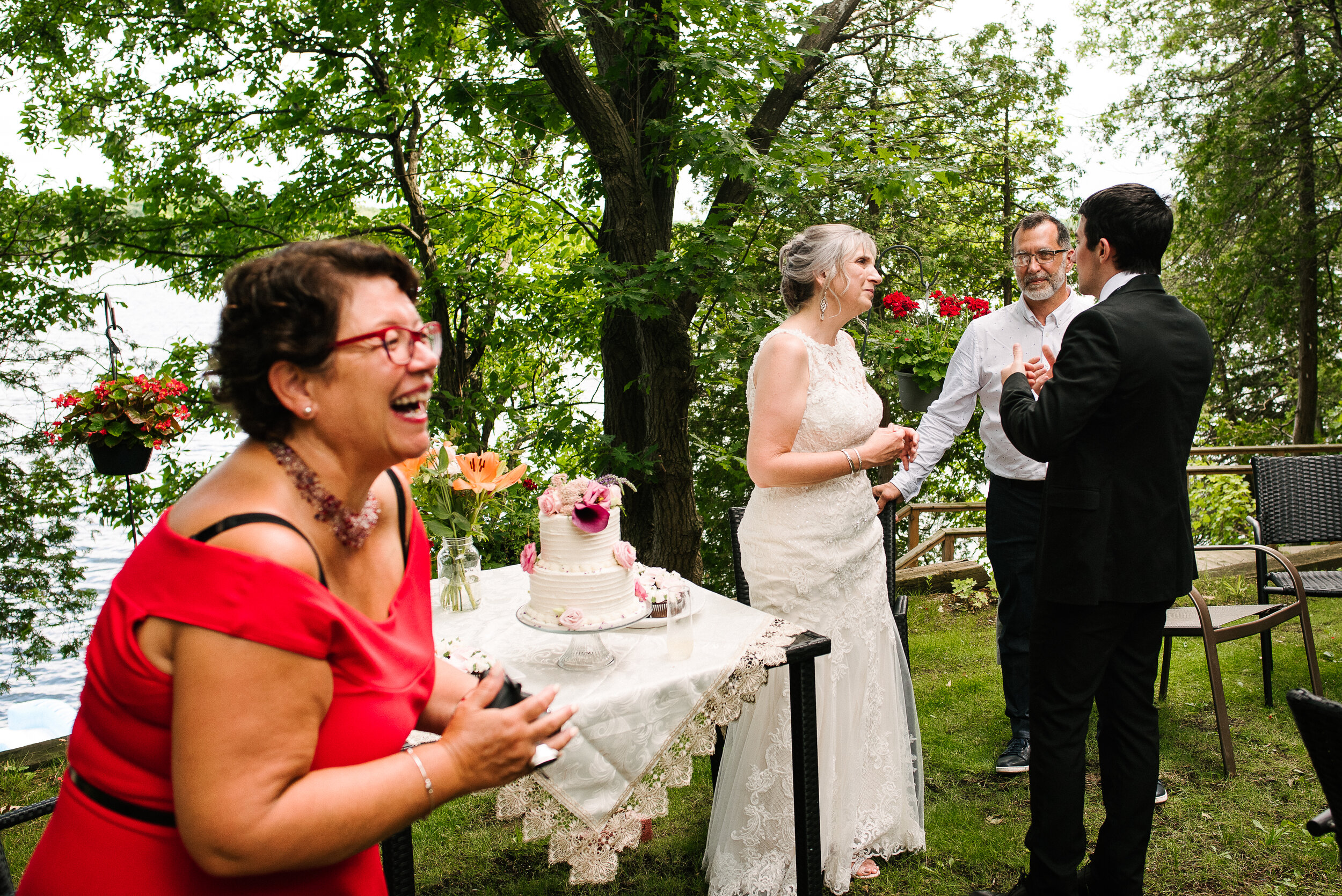 Guest laughing during Verona, Ontario wedding