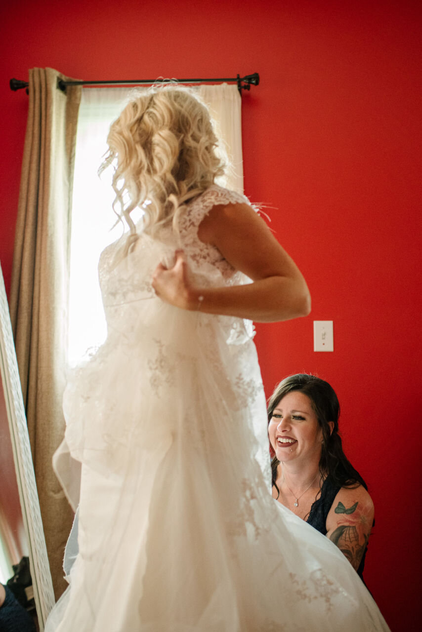 Bride getting ready in her room before her Ontario elopement 