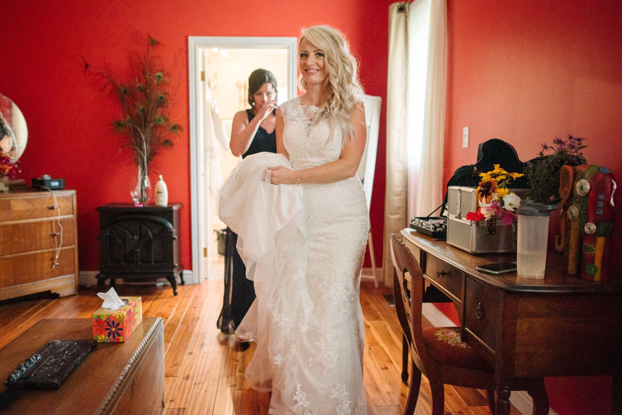 Bride leaving her suite at her Ontario elopement venue 