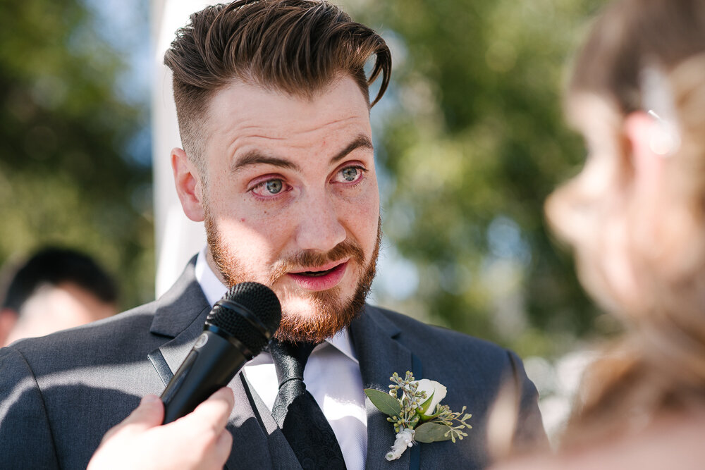 emotional picture of groom saying his vows, Viara Mileva wedding photojournalism 